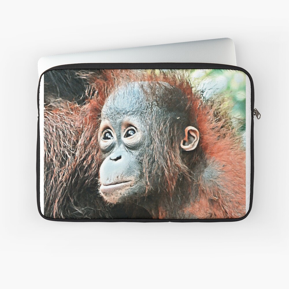 Baby orangutan living in Tanjung Puting National Park Laptop Sleeve
