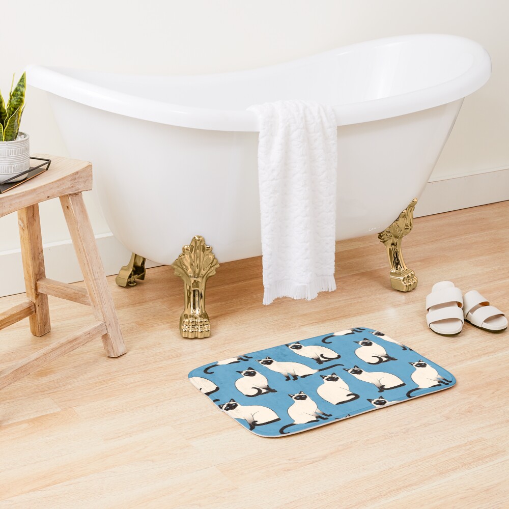 Siamese Cats sparse on blue Bath Mat