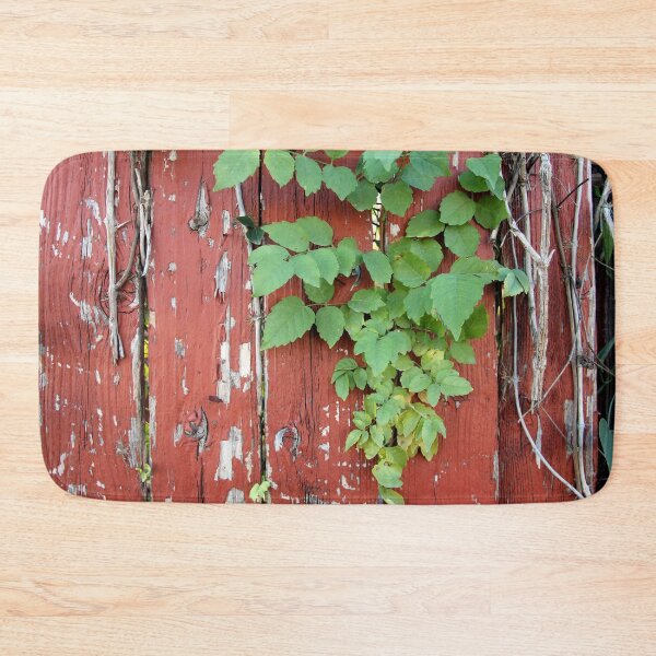 Item preview, Bright green leaves peeking through a rustic wooden fence designed and sold by Rennie Palmer.