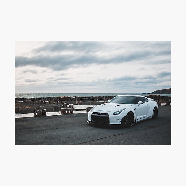 white wide body gtr on an overcast day Photographic Print