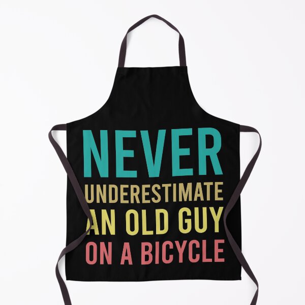 Item preview, never underestimate an old guy on a bicycle designed and sold by VESTITCH.