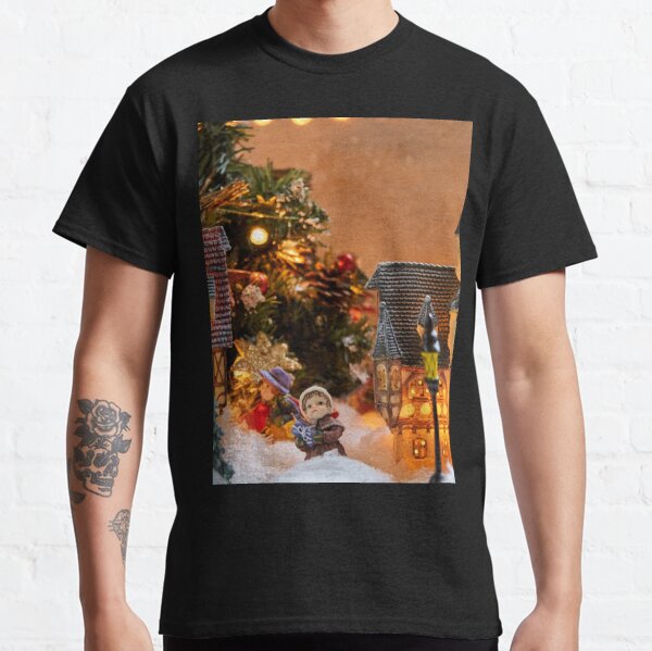 Traditional Christmas village with singers caroling  Classic T-Shirt