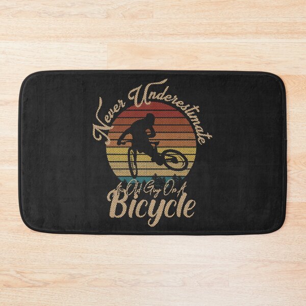 Item preview, Never Underestimate An Old Guy On A Bicycle designed and sold by Thevulcano.