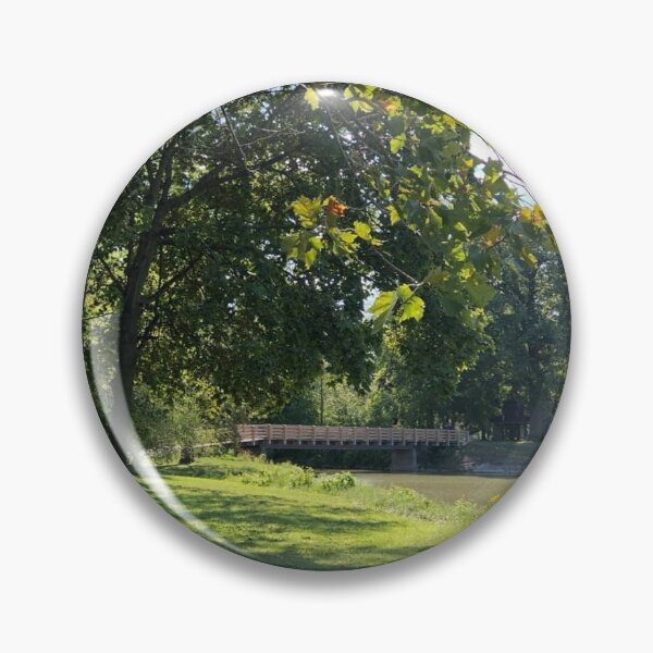 Item preview, Little bridge in a park surrounded by trees designed and sold by FlowersAndMore.