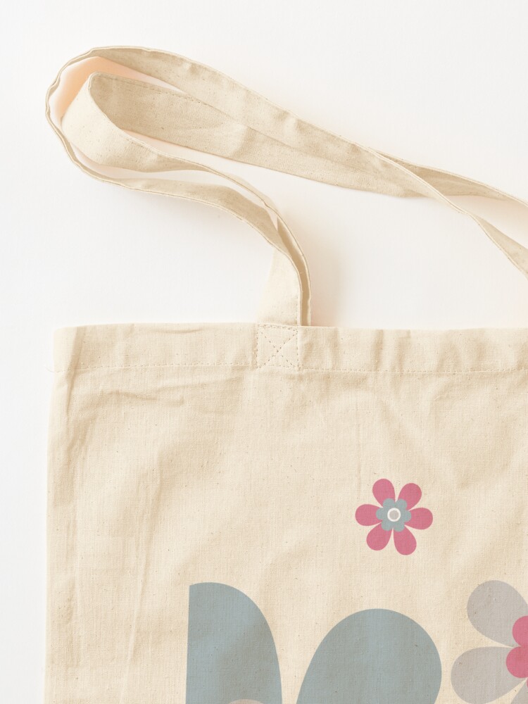 Pale Egg Against Blue Tote Bag