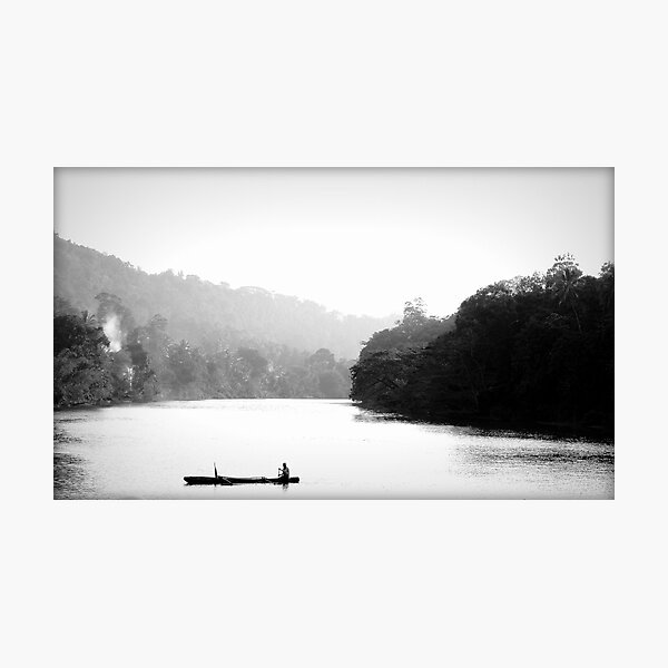 One Man in his Boat Photographic Print