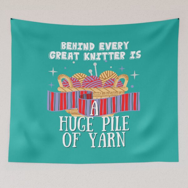 Item preview, Behind every great knitter is a huge pile of yarn with bold black and white font, basket of purple yarn on teal background. designed and sold by milkasweet.
