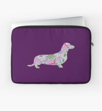 Dackel mit buntem Blumengarten-Muster Laptoptasche