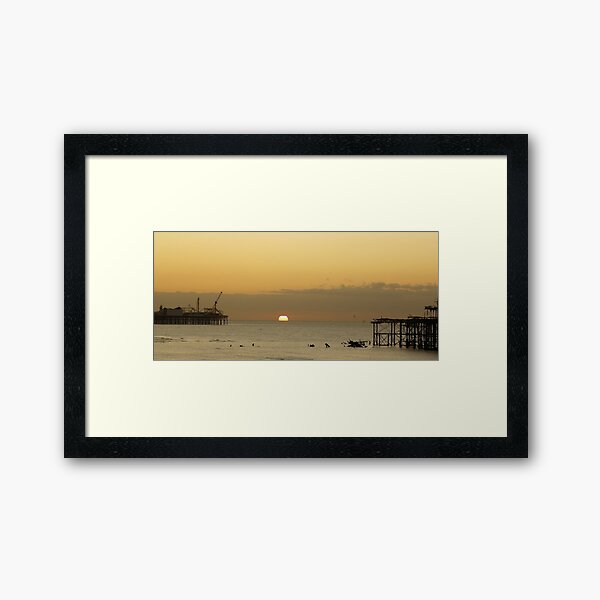 Sunrise between the piers... Framed Art Print