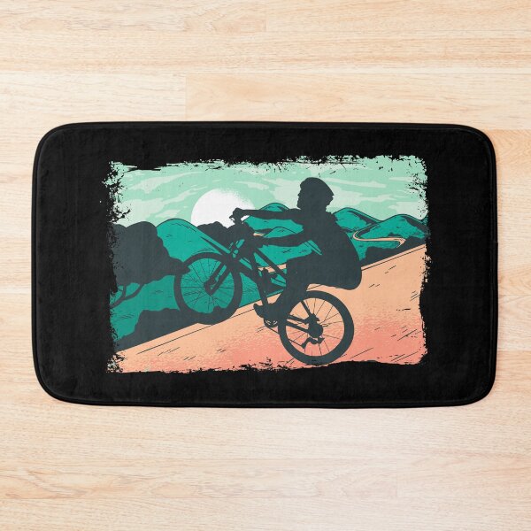 Item preview, Mountain biker rolls down a steep mountain in a wheelie designed and sold by Denis Rösler.
