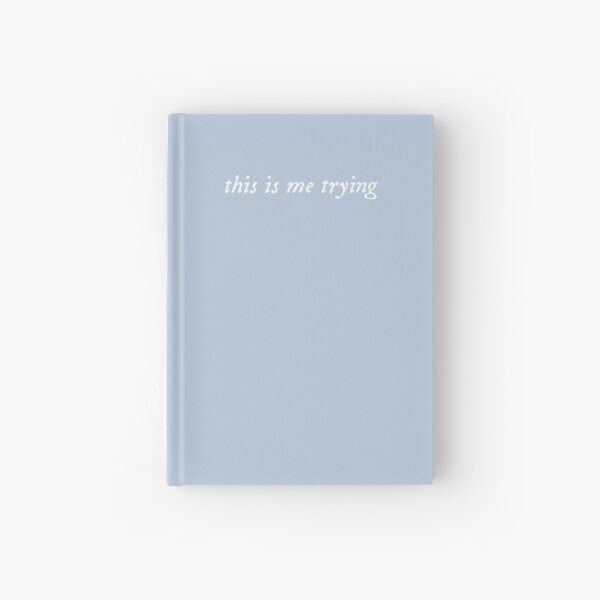 This is me trying Folklore Taylor Swift Hardcover Journal