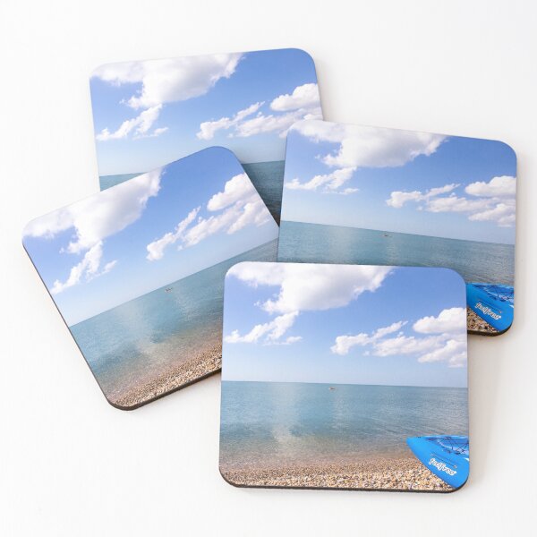 Item preview, Kayak on Seaford beach with a calm blue sea, East Sussex, UK  designed and sold by Zoe Power.