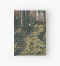 Boy walking through mystic forest landscape photography Hardcover Journal
