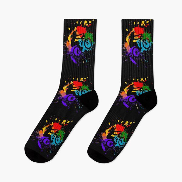 Item preview, Mountain biker jumps with blobs of colored paint designed and sold by Denis Rösler.