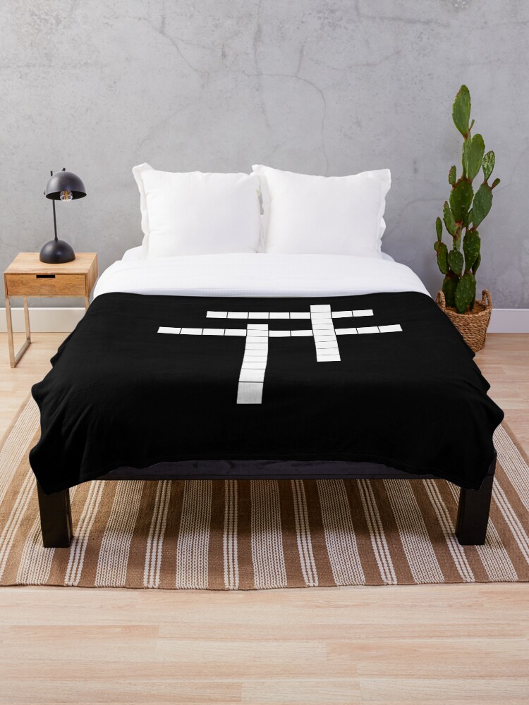 crossword clue bed cover