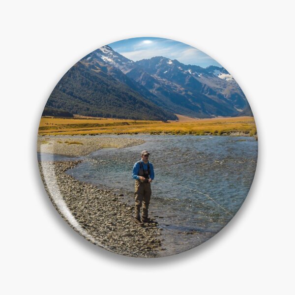 Item preview, An Angler fly fishing for trout on the Ahuriri river, surrounded by mountains designed and sold by SnapTPhotograph.