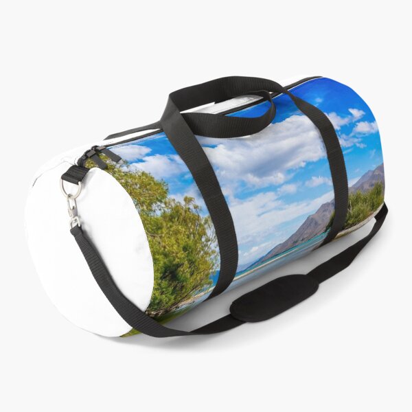 Item preview, The slow flowing Pukaki river as it flows into Lake Benmore on a sunny day, New Zealand designed and sold by SnapTPhotograph.