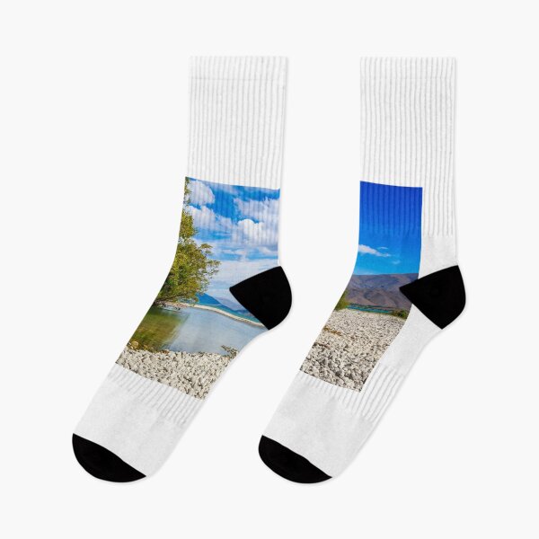 Item preview, The slow flowing Pukaki river as it flows into Lake Benmore on a sunny day, New Zealand designed and sold by SnapTPhotograph.