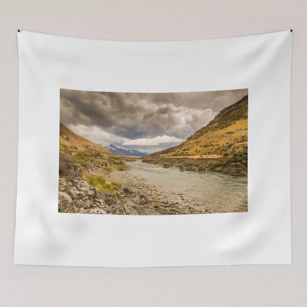 Item preview, A mountain landscape and river on a cloudy day in New Zealand near Omarama designed and sold by SnapTPhotograph.