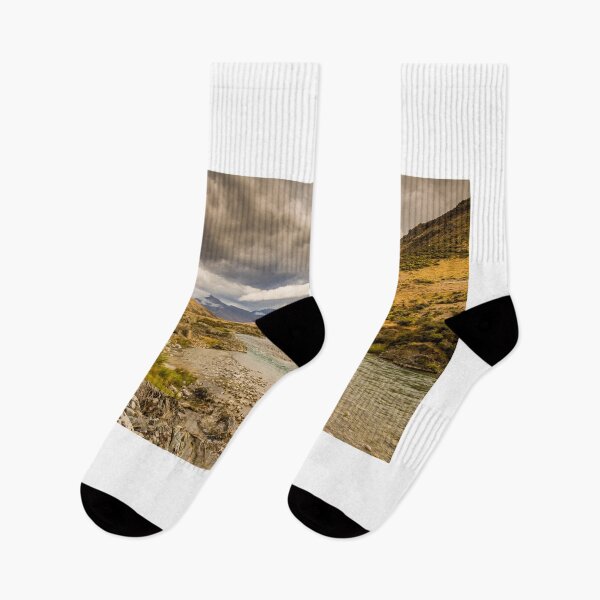 Item preview, A mountain landscape and river on a cloudy day in New Zealand near Omarama designed and sold by SnapTPhotograph.
