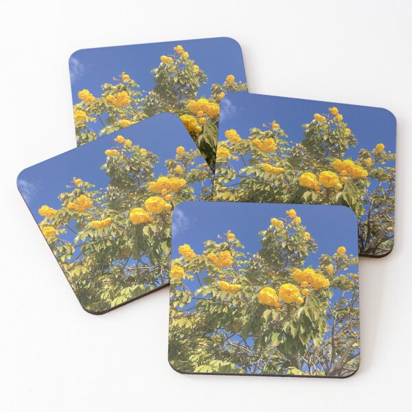 Item preview,  Tree with large flowers with bright blue sky in background designed and sold by Taleta Hollis.