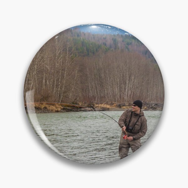 Item preview, A fly fisherman hooked into a big fish in a river with the rod bent designed and sold by SnapTPhotograph.