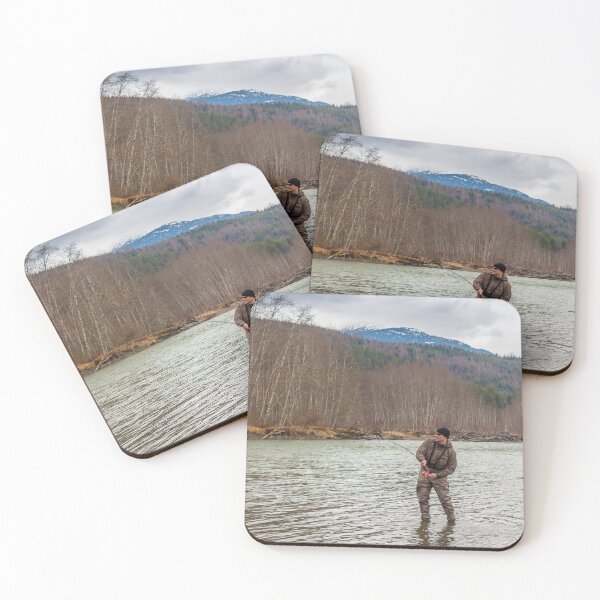 Item preview, A fly fisherman hooked into a big fish in a river with the rod bent designed and sold by SnapTPhotograph.