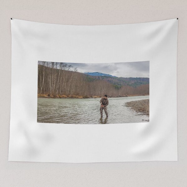 Item preview, A fly fisherman hooked into a big fish in a river with the rod bent designed and sold by SnapTPhotograph.