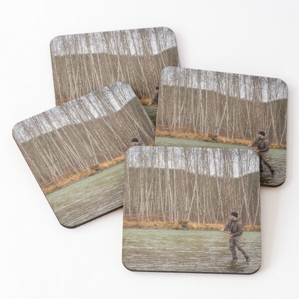 Item preview, A fly fisherman hooked into a big fish in a river with the rod bent designed and sold by SnapTPhotograph.