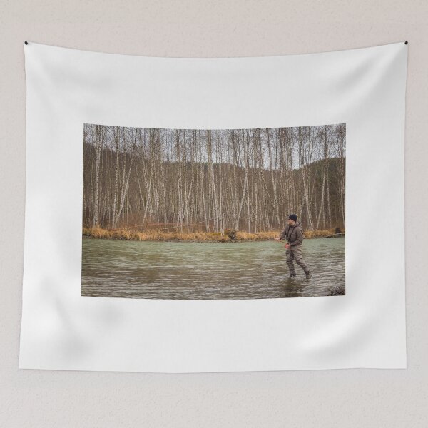 Item preview, A fly fisherman hooked into a big fish in a river with the rod bent designed and sold by SnapTPhotograph.