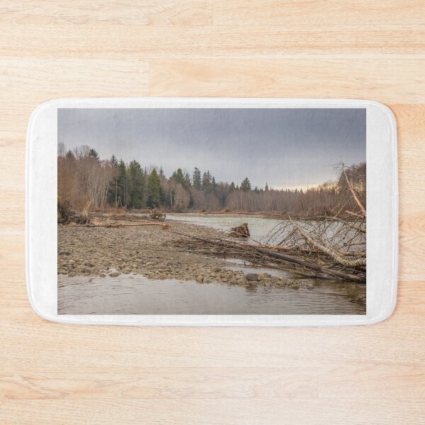 Item preview, A cold river in British Columbia, Canada, during a spring at sunset designed and sold by SnapTPhotograph.