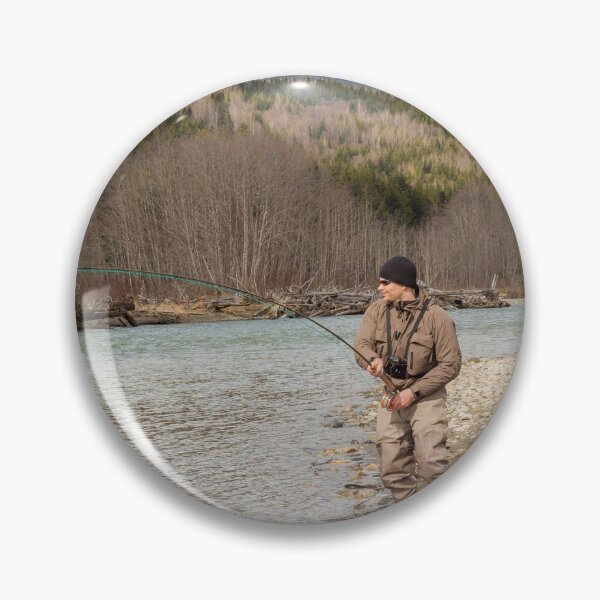 Item preview, A fly fisherman hooked into a big fish in a river with the rod bent designed and sold by SnapTPhotograph.