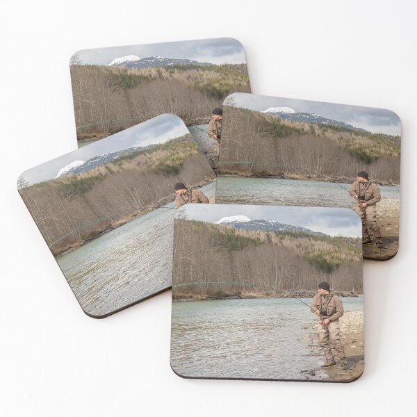 Item preview, A fly fisherman hooked into a big fish in a river with the rod bent designed and sold by SnapTPhotograph.