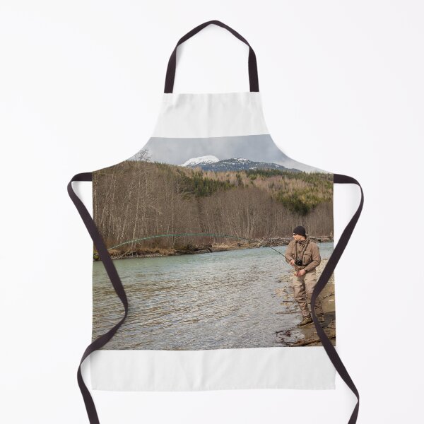 Item preview, A fly fisherman hooked into a big fish in a river with the rod bent designed and sold by SnapTPhotograph.