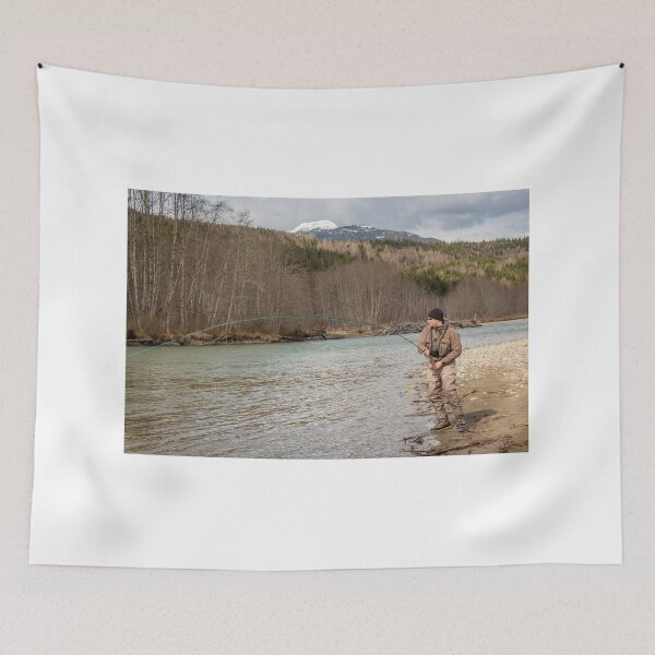 Item preview, A fly fisherman hooked into a big fish in a river with the rod bent designed and sold by SnapTPhotograph.