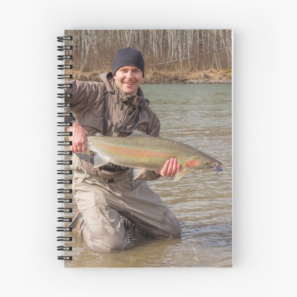 Item preview,  A fly fisherman holding a big steelhead in the spring sun. designed and sold by SnapTPhotograph.