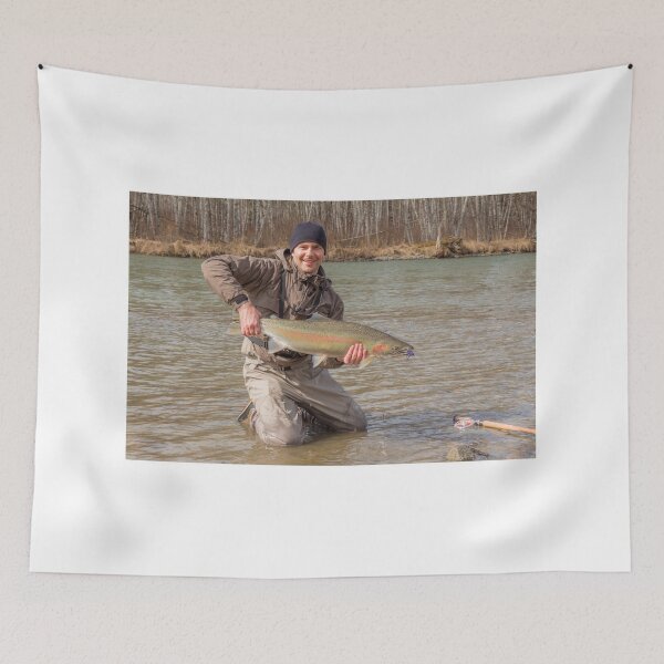 Item preview,  A fly fisherman holding a big steelhead in the spring sun. designed and sold by SnapTPhotograph.