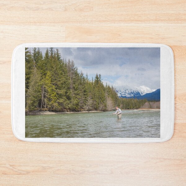 Item preview, A fisherman spey casting on a mountain river in spring, in British Columbia designed and sold by SnapTPhotograph.