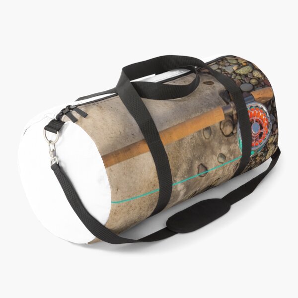 Item preview, Salmon spey fly rod and reel resting on gravel and snow designed and sold by SnapTPhotograph.