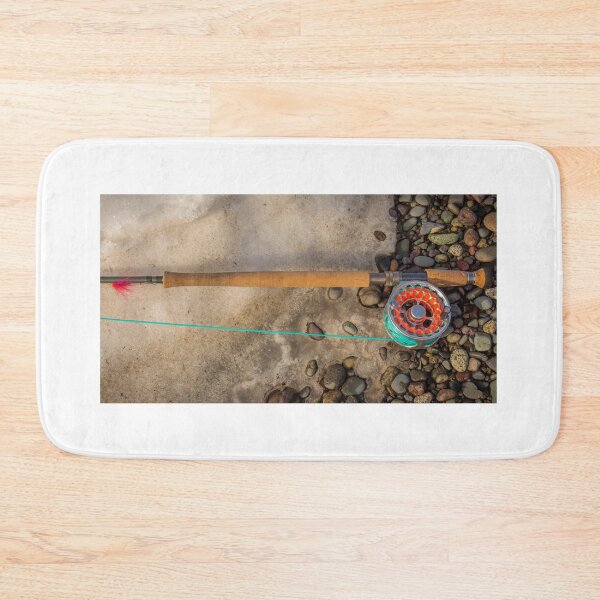 Item preview, Salmon spey fly rod and reel resting on gravel and snow designed and sold by SnapTPhotograph.
