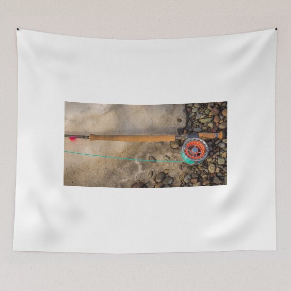 Item preview, Salmon spey fly rod and reel resting on gravel and snow designed and sold by SnapTPhotograph.