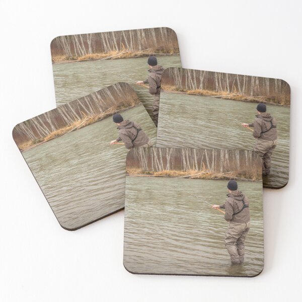 Item preview, A fly fisherman hooked into a big fish in a river with the rod bent designed and sold by SnapTPhotograph.