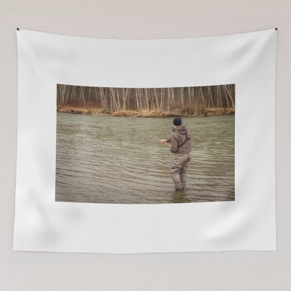 Item preview, A fly fisherman hooked into a big fish in a river with the rod bent designed and sold by SnapTPhotograph.