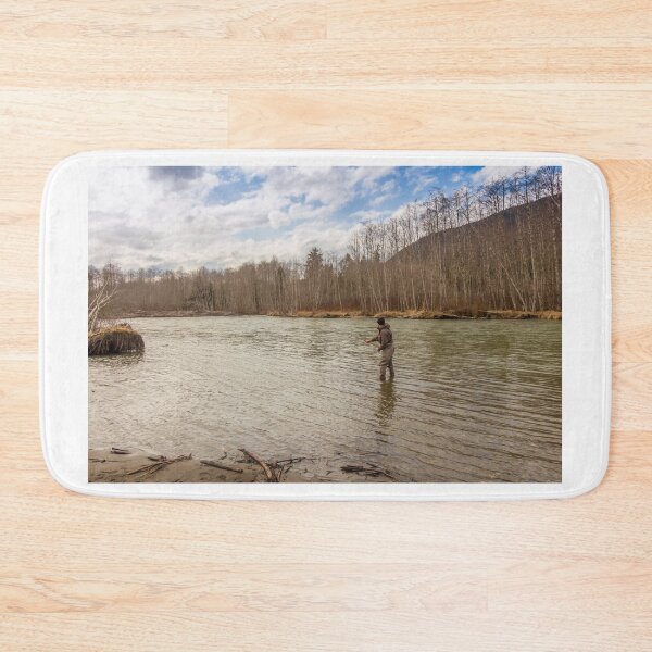 Item preview, A fisherman with a big fish on the line in a spring river in Canada designed and sold by SnapTPhotograph.