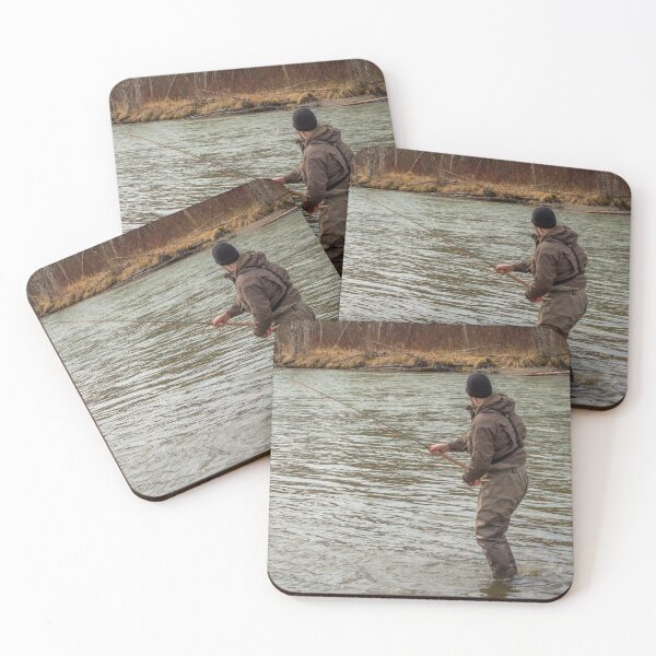 Item preview, A fly fisherman hooked into a big fish in a river with the rod bent designed and sold by SnapTPhotograph.