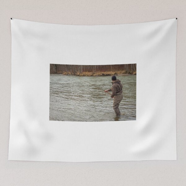 Item preview, A fly fisherman hooked into a big fish in a river with the rod bent designed and sold by SnapTPhotograph.