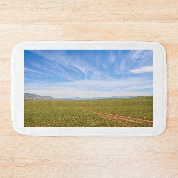 Item preview, A track across a Mongolian grassland with mountains in the background designed and sold by SnapTPhotograph.