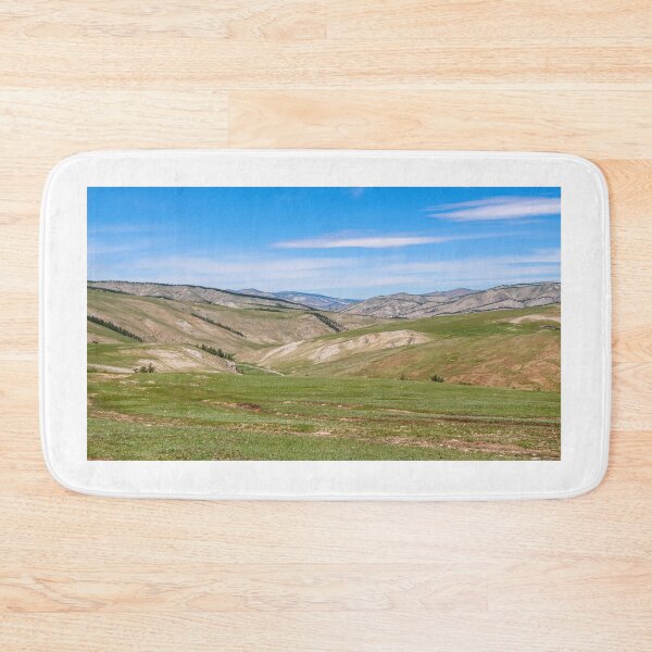 Item preview, Rolling Mongolian hills and mountains, with a blue cloudy sky designed and sold by SnapTPhotograph.