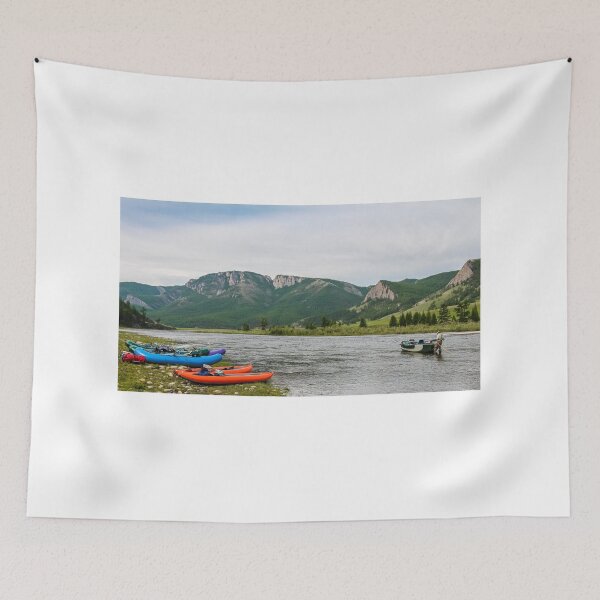 Item preview, Fishing guide setting up at camp early on the river in the morning designed and sold by SnapTPhotograph.