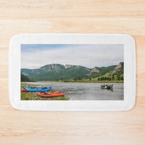 Item preview, Fishing guide setting up at camp early on the river in the morning designed and sold by SnapTPhotograph.